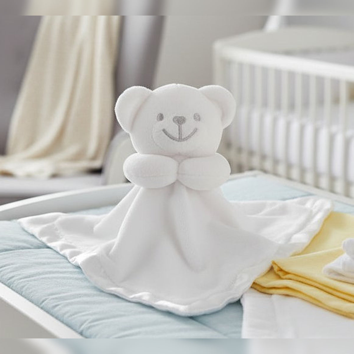 Comforter with satin trim and back